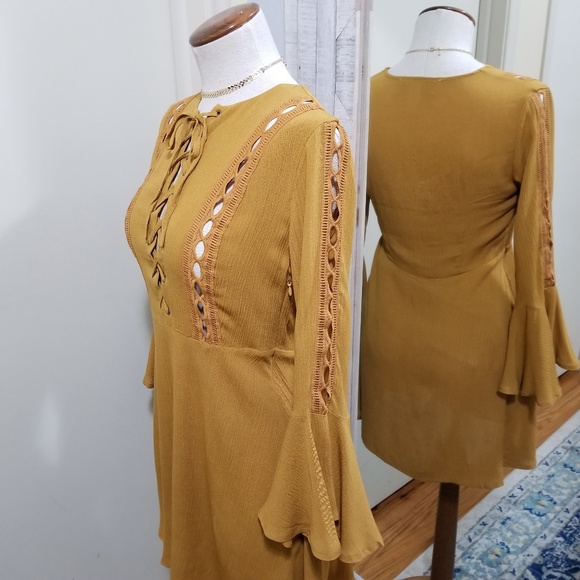 Shop the trends Dresses Bell Sleeve Laceup Flared Dress Mustard